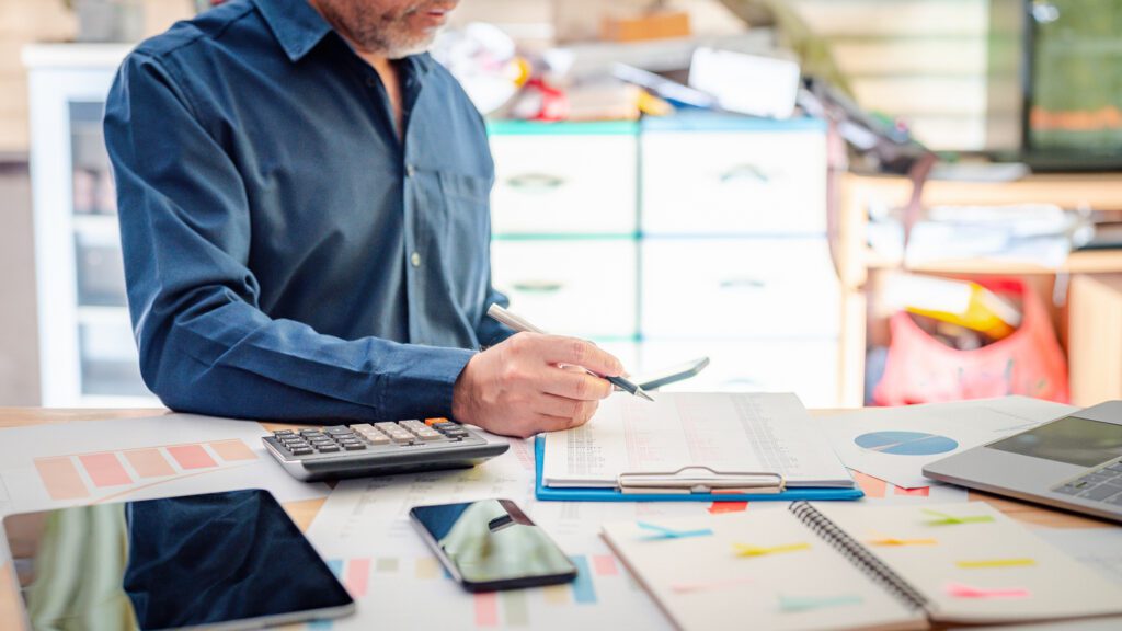 Businessman working in office, Maximizing Business Efficiency and Profitability concept, Power of Collaboration, Communication, Strategic Planning with Paperwork Management, Brokerage, and Accounting