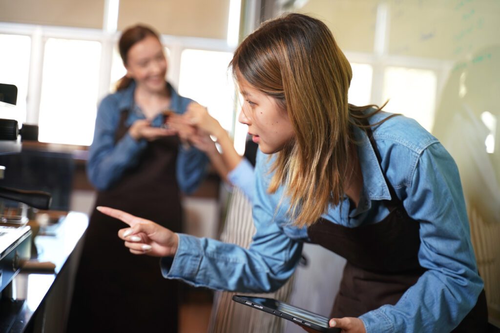 Group of young women preparing coffee